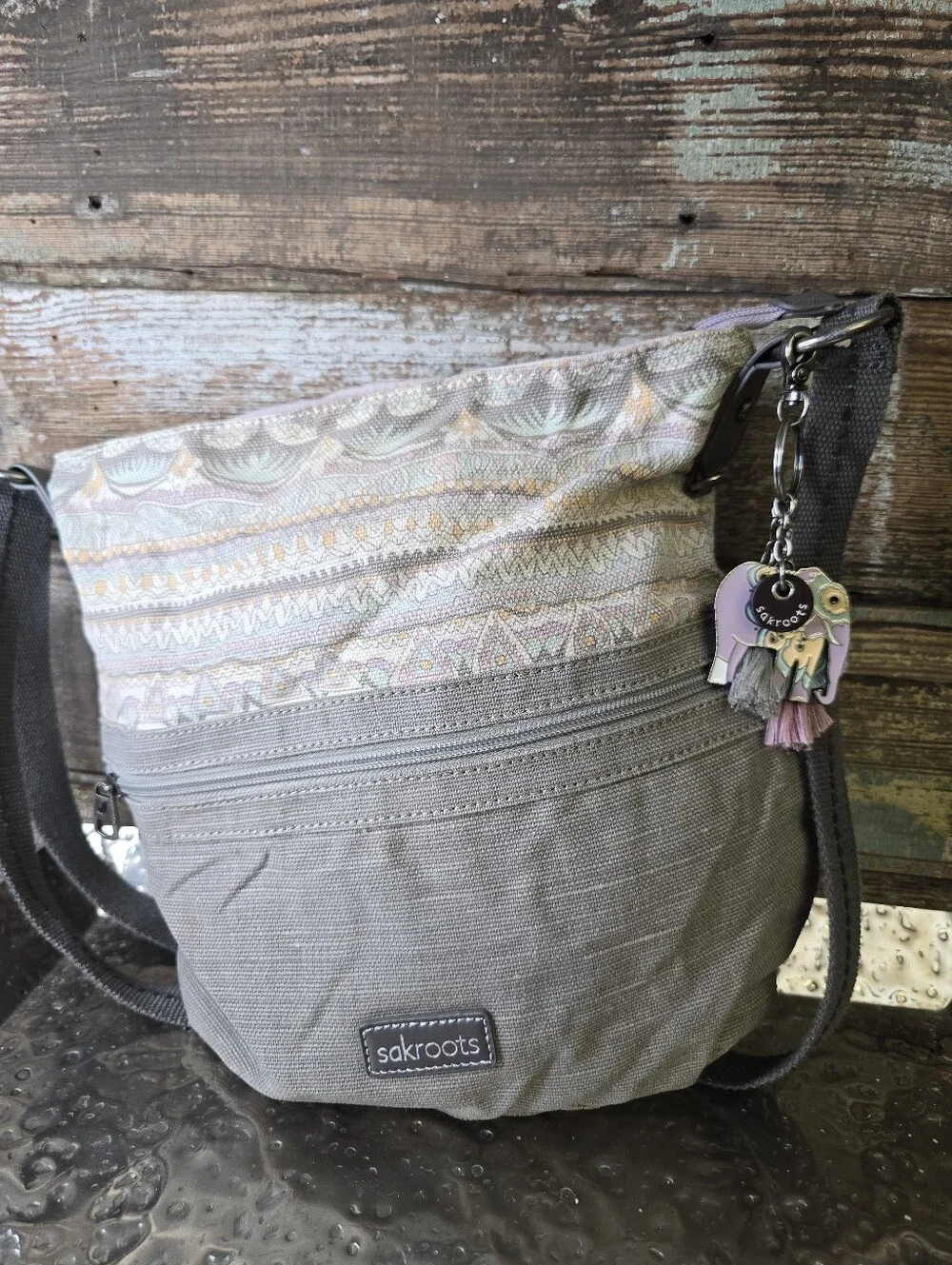 Sakroots Gray Crossbody with Pastel Pattern and Tassel Charm